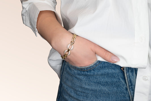 Brățară placată cu aur 18 K Mia, model cu zale si pietre albe, lungime 17,5 cm cu prelungire de 1,5 cm