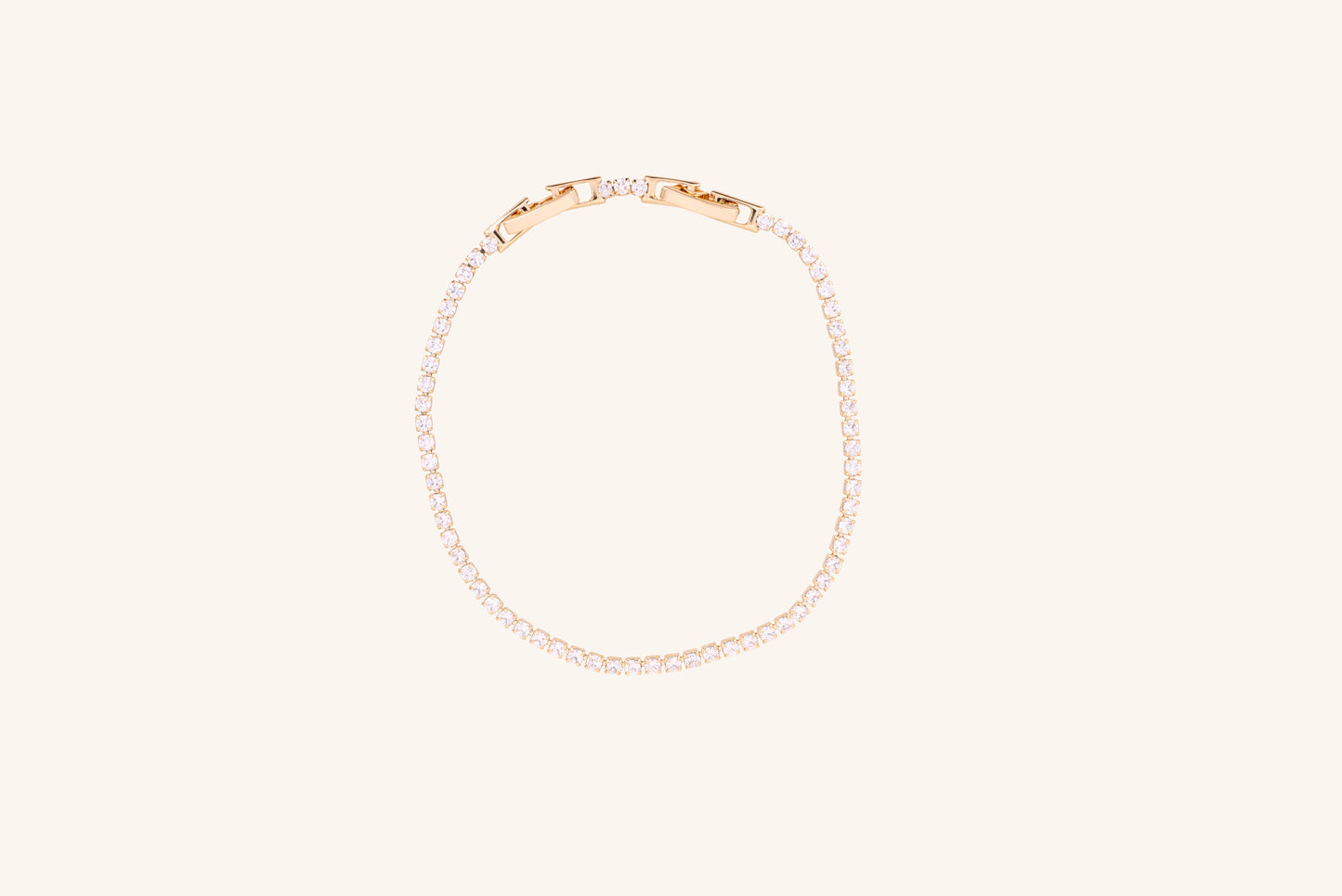 Brățară placată cu aur 18 K Celine, model tenis cu pietre albe , lungime 17 cm cu o prelungire de 2 cm 