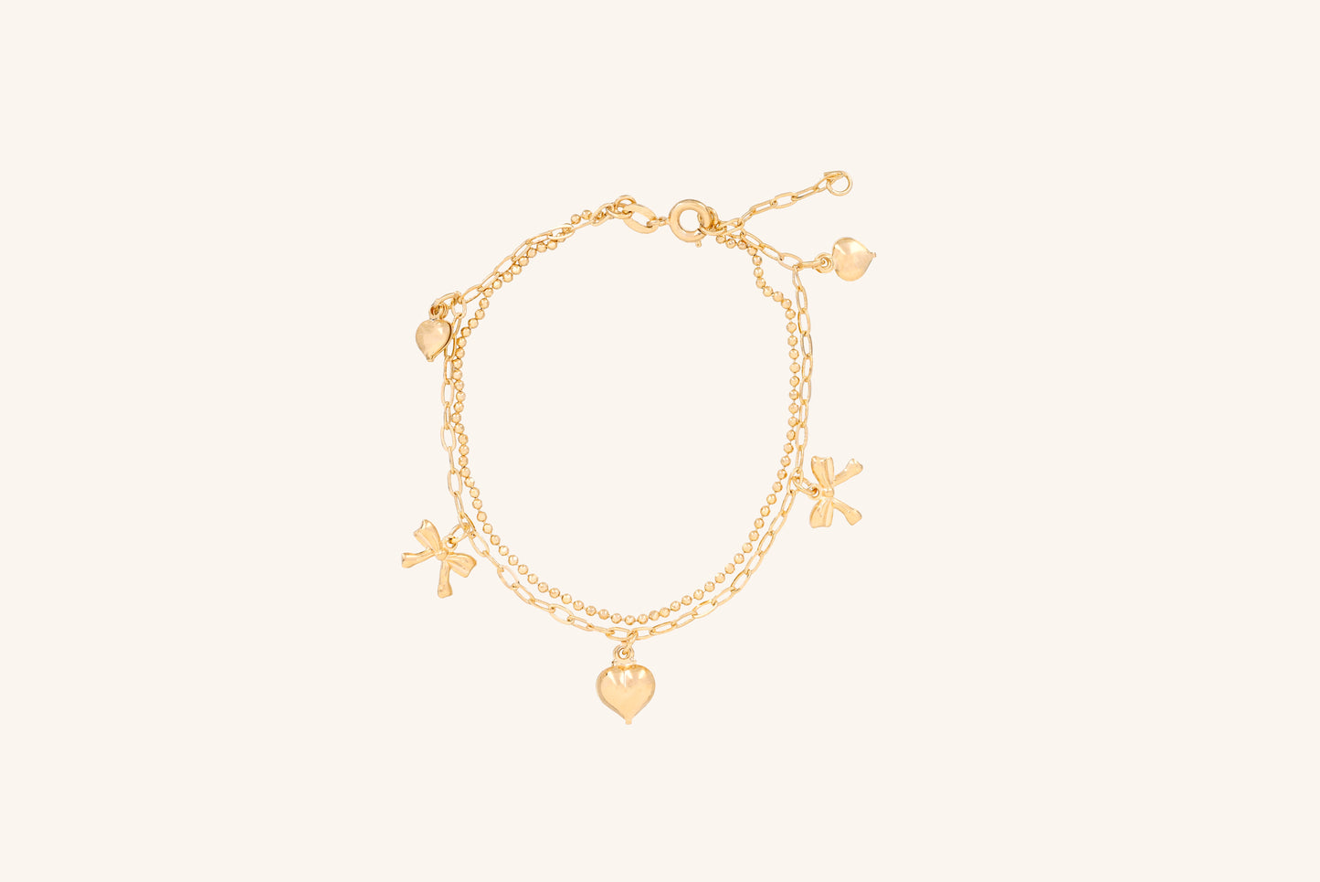 Brățară placată cu aur 18 K Clarisa, model cu pandantive in forma de inima si fundita, lungime 17,5 cm cu o prelungire de 2 cm