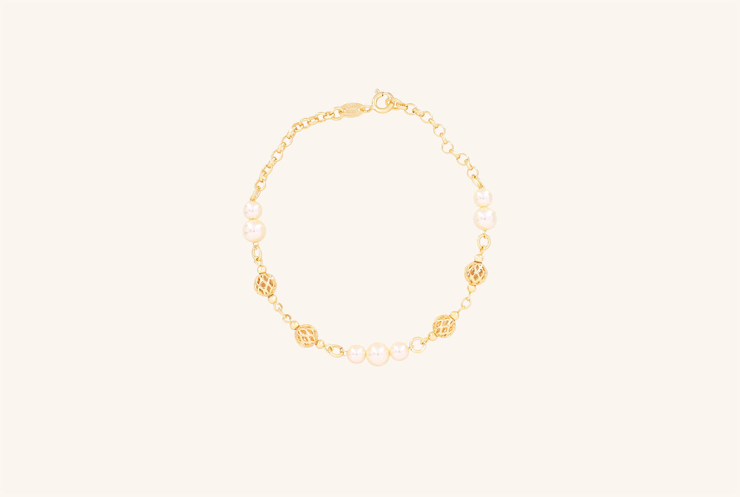 Brățară placată cu aur 18 K Dana, model cu bilute si perlute albe de plastic , lungime 19 cm.